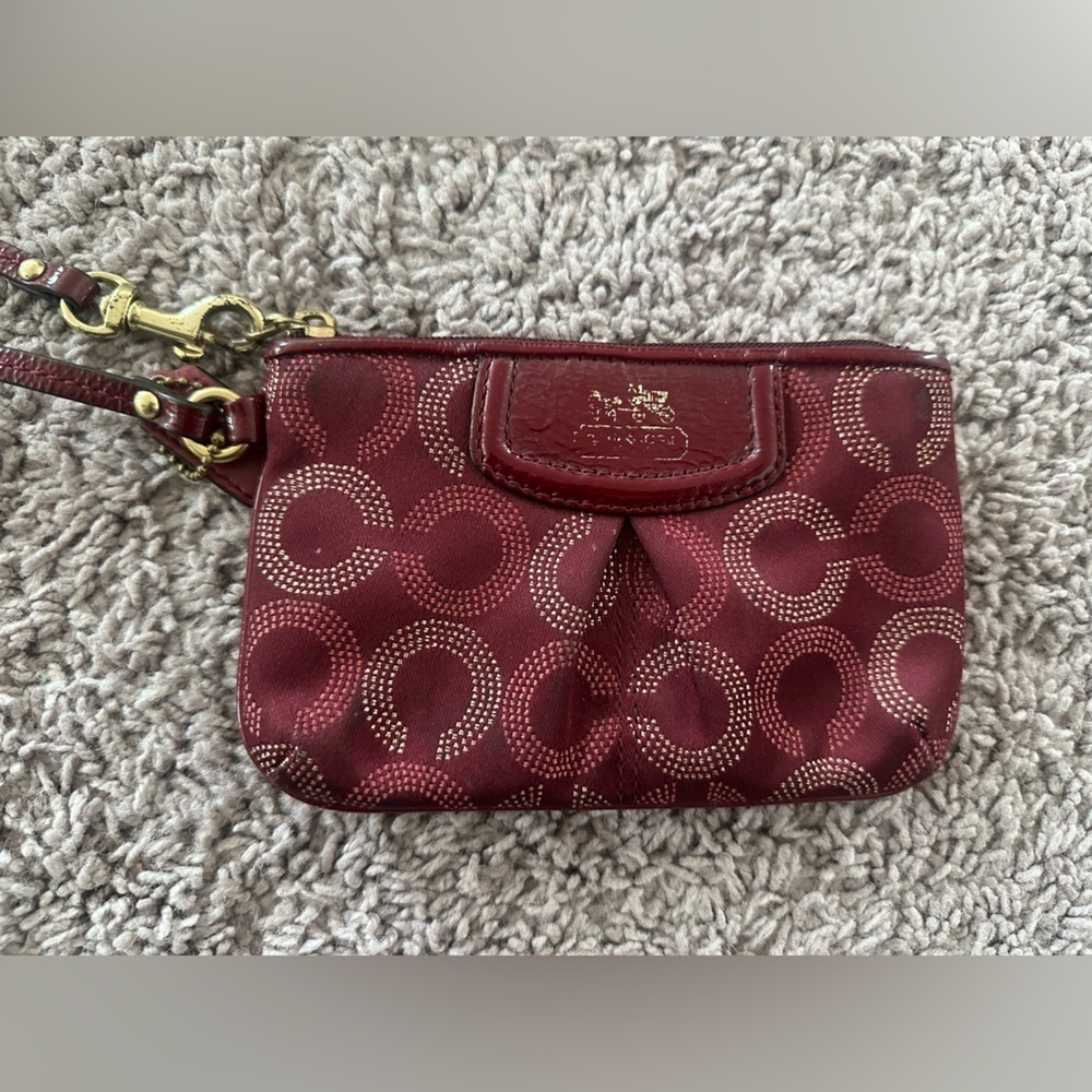 Preloved Coach Maroon Wristlet with Circular Design